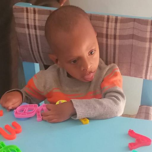 Fereje working on the Amharic fidel